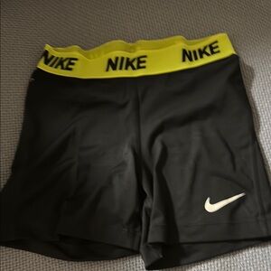 Nike Women's Athletic Shorts in Black and Neon Yellow